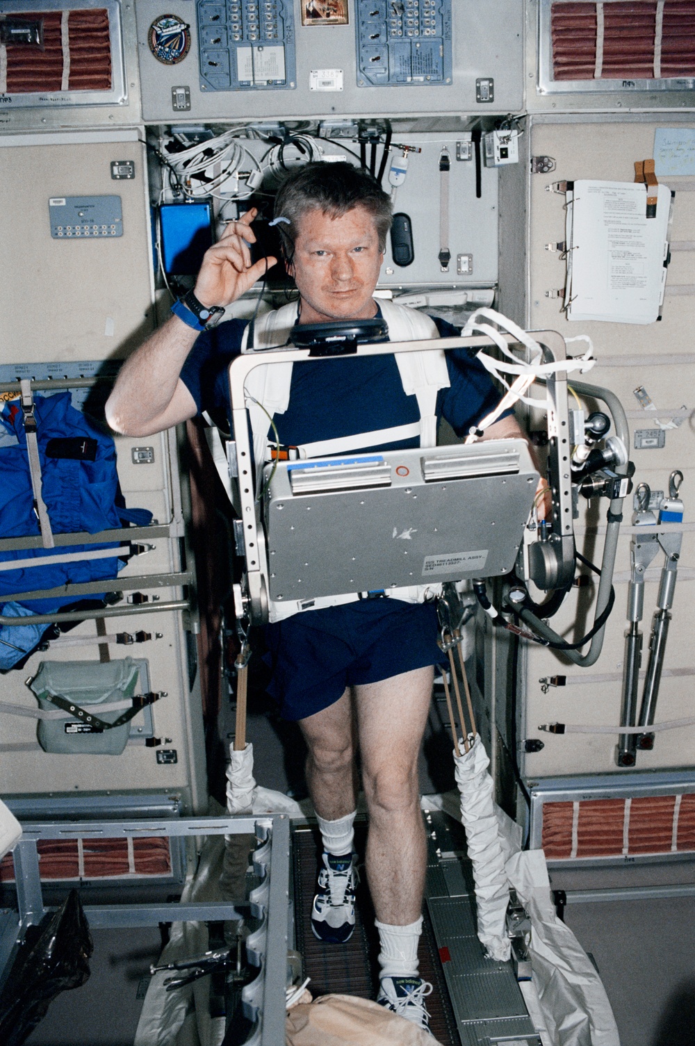 Shepherd on ISS treadmill in Service module