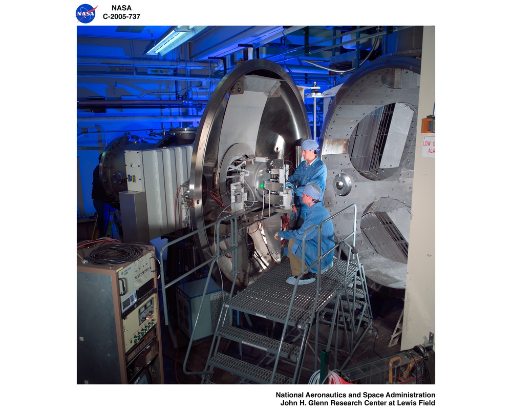 NASA's Evolutionary Xenon Thruster (NEXT) Long Duration Test (LDT) with  test article EM3 being installed into tank 16