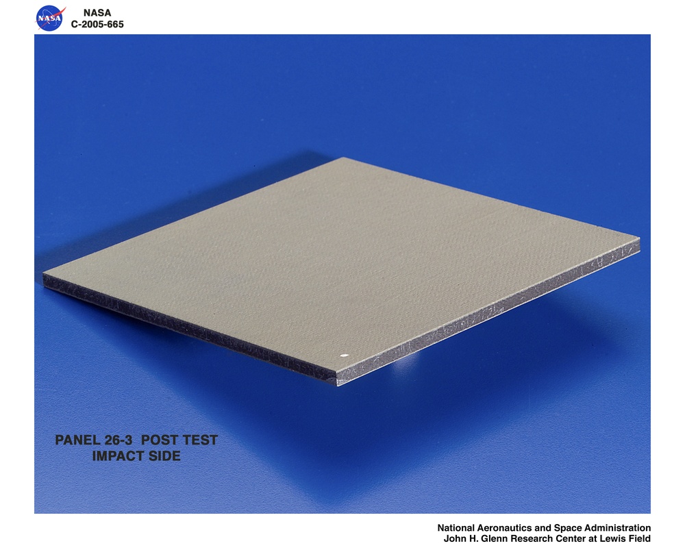 Panel 26-3 post test  RCC carbon / carbon fiber panels - the panels are space shuttle tile material being tested in the ballistics lab building 49