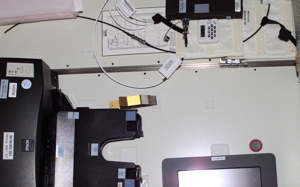 View of a printer and a PDA in the U.S. Laboratory during Expedition Three