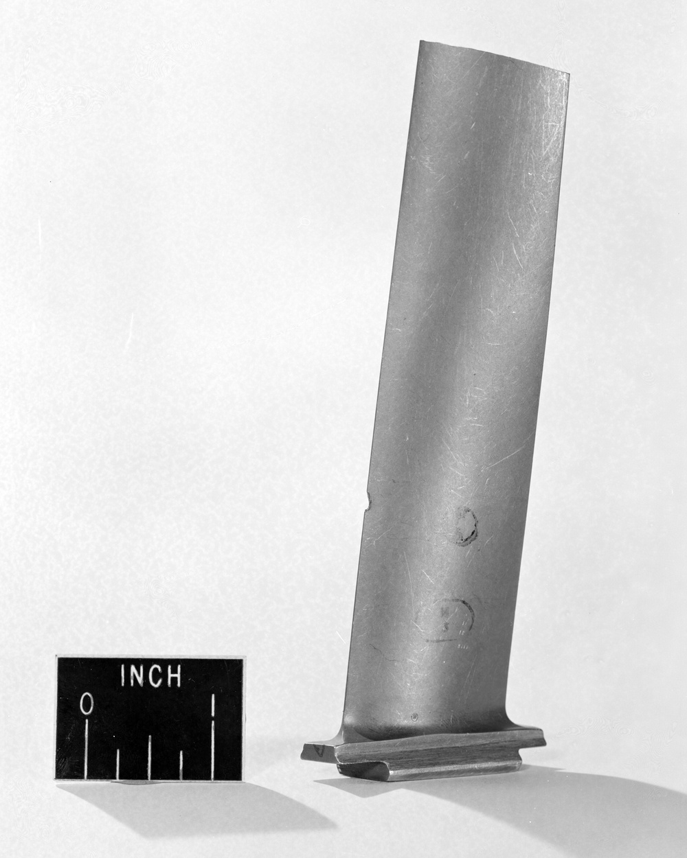 J-47 COMPRESSOR BLADE DAMAGED BY A FOREIGN OBJECT