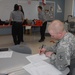 Members of the 81st Civil Affairs Battalion help teach EMT skills to high school students