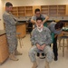 Members of the 81st Civil Affairs Battalion help teach EMT skills to high school students