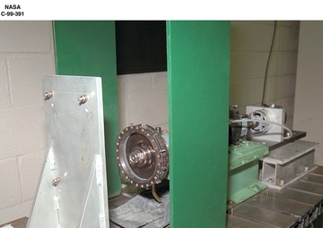 RUB STRIP MATERIAL EVALUATIONS USING FAN BLADE TIP SIMULATOR