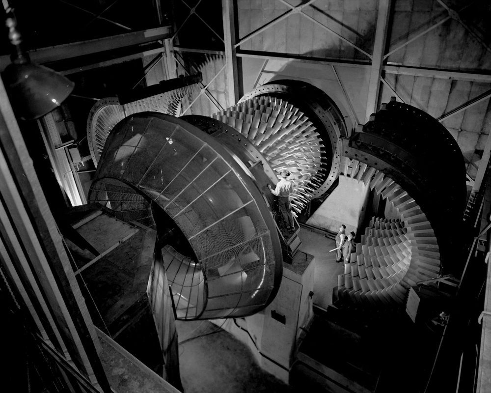 AXIAL FLOW COMPRESSOR IN THE 8X6 FOOT SUPERSONIC WIND TUNNEL - ELECTRIC MOTORS OF 87,000 HORSEPOWER DRIVE THIS HUGE COMPRESSOR TO PRODUCE 1300 MILE PER HOUR AIRSPEEDS - THE 2 HALVES OF THE 18 FOOT DIAMETER CASING ARE SHOWN OPENED TO EXPOSE THE 7 ROW