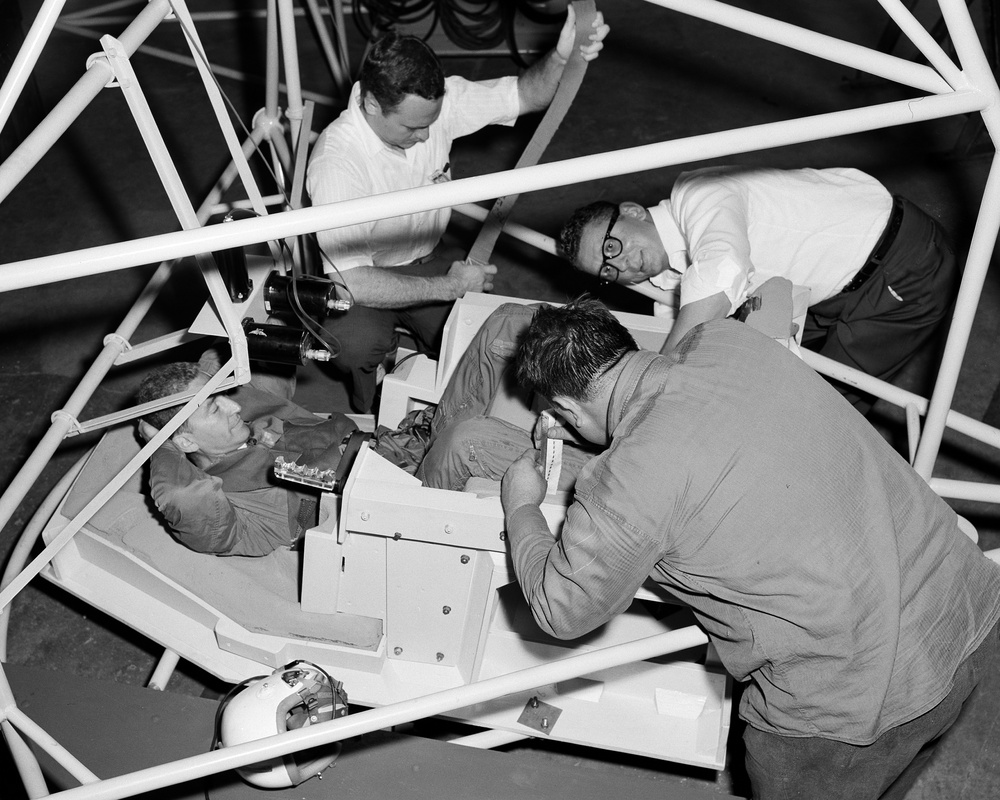 PROJECT MERCURY - JOE ALGRANTI MODELING ASTRONAUT SPACE CHAIR IN THE ALTITUDE WIND TUNNEL AWT