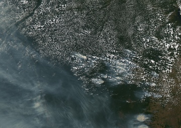 Smoke Chokes Clouds : Image of the Day