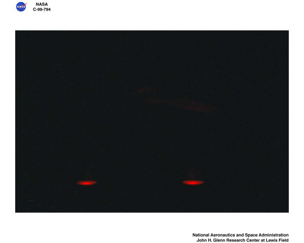TRANSITION FROM IGNITION TO FLAME GROWTH UNDER EXTERNAL RADIATION IN THREE DIMENSIONS TIGER-3D TEST RESULTS FROM THE JAPAN MICROGRAVITY CENTER JAMIC