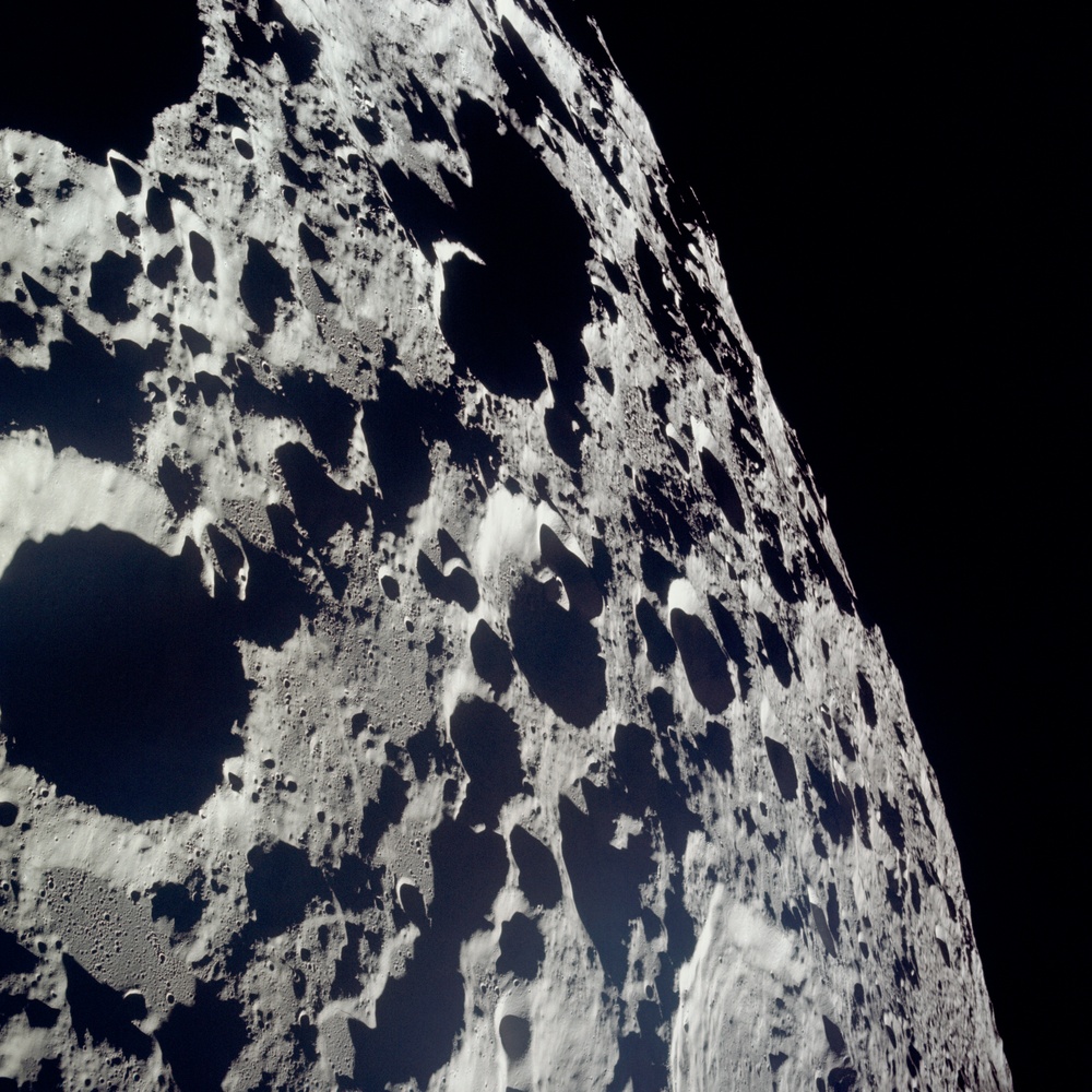 Apollo 11 Mission image - View of Moon, crater on horizon, Crater 308 and TO 15