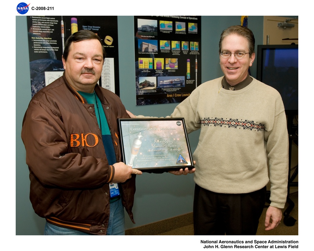 Presentation of an Ares 1-X Certificate of Appreciation