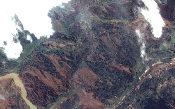 Dam Breach Swells Jianjiang River: Image of the Day