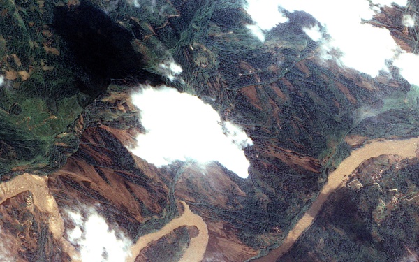 Dam Breach Swells Jianjiang River: Image of the Day