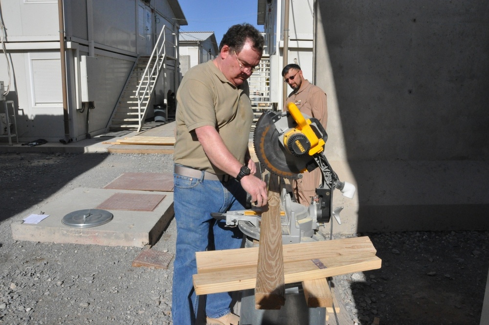 USACE volunteers build walkway, make moving around easier for Wounded Warriors at KAF
