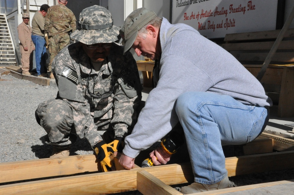 USACE volunteers build walkway, make moving around easier for Wounded Warriors at KAF