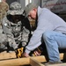 USACE volunteers build walkway, make moving around easier for Wounded Warriors at KAF