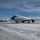 108th Wing removes snow from winter storm Nemo Two U.S. Air Force aircraft, identifiable as KC-135 Stratotanker refueling aircraft, are parked on a snow-covered flight line. The foreground aircraft displays 'U.S. Air Force' markings and a tail number partially readable as 3544, with engine nacelle markings indicating '108 Wing'. The scene depicts a cold winter day at what appears to be a military air base, with clear blue skies and snow accumulated on the tarmac and aircraft surfaces.
