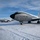 108th Wing removes snow from winter storm Nemo Two U.S. Air Force KC-135 Stratotanker aircraft are parked on a snow-covered flight line, assigned to the 108th Wing, New Jersey Air National Guard. The foreground aircraft bears tail number 3544 and displays '108 WG' and 'New Jersey' markings on its engine nacelle. The scene depicts winter conditions with snow accumulated on the aircraft fuselages and tarmac.