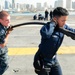 USS Carl Vinson sailors pull cable