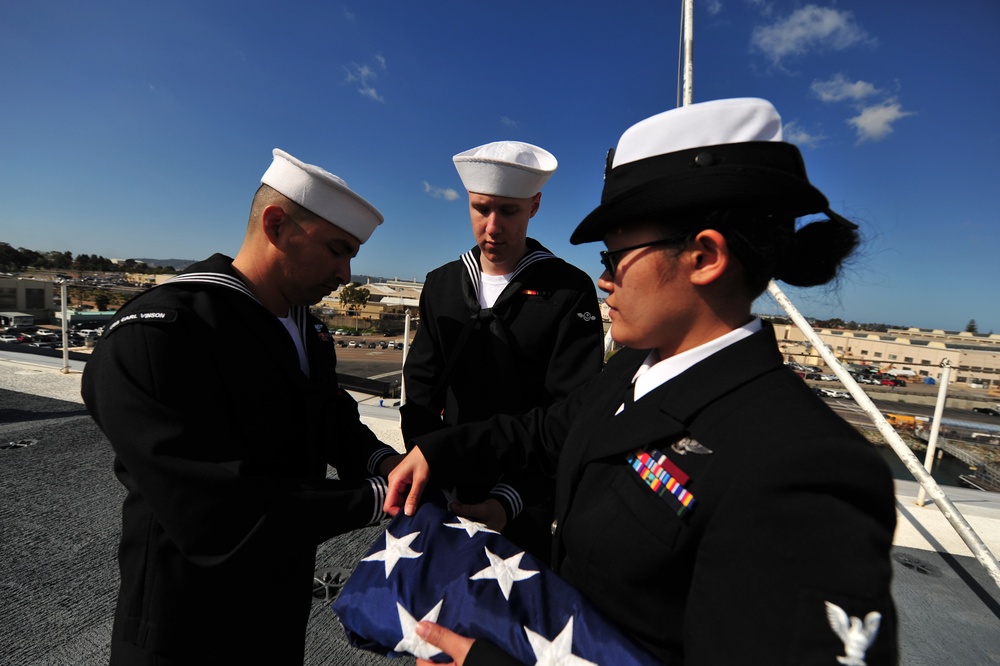 USS Carl Vinson sailors shift the colors