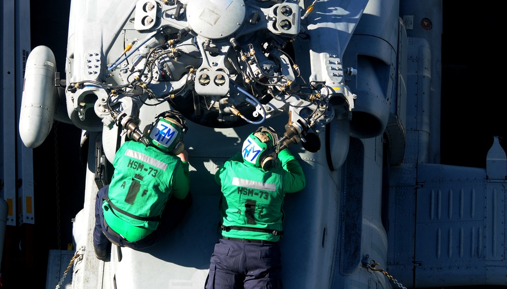 USS Carl Vinson sailors perform maintenance