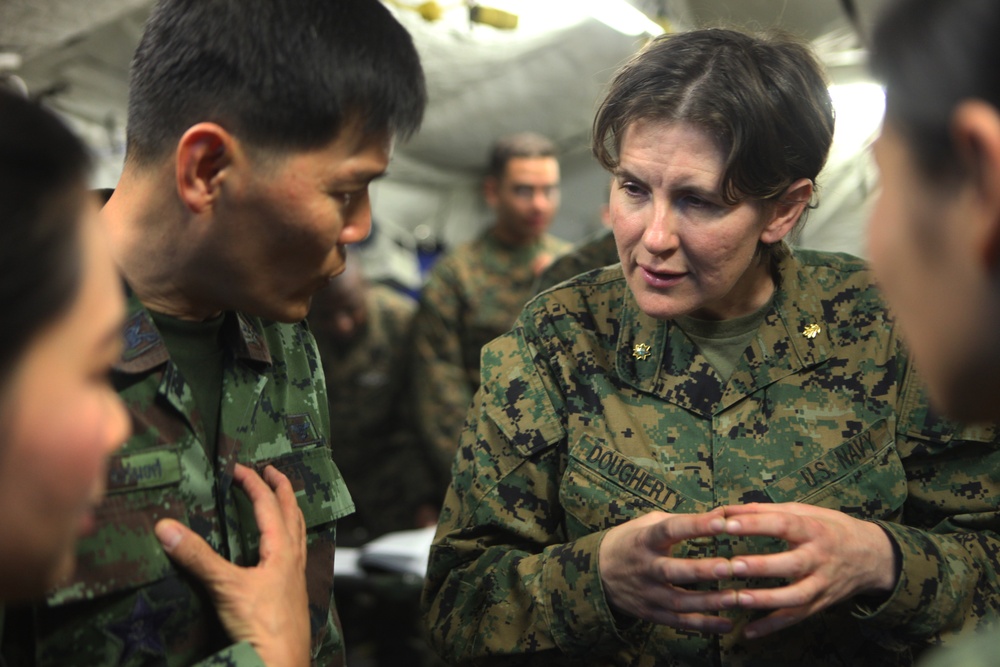 U.S. Marines, Thai Army medical personnel work hand-in-hand for field surgery