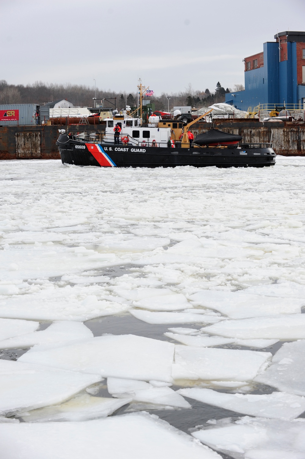 Coast Guard Cutter Shackle and Tackle break ice on the Penobscot River