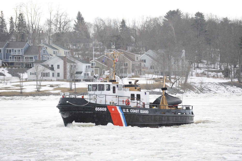 Coast Guard Cutter Shackle and Tackle break ice on the Penobscot River