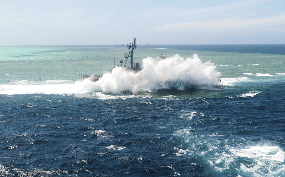 USS Guardian grounded by reef