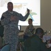 2nd Stryker Brigade commander speaks with foreign military service members at Army War College