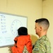 Soldiers teach local children