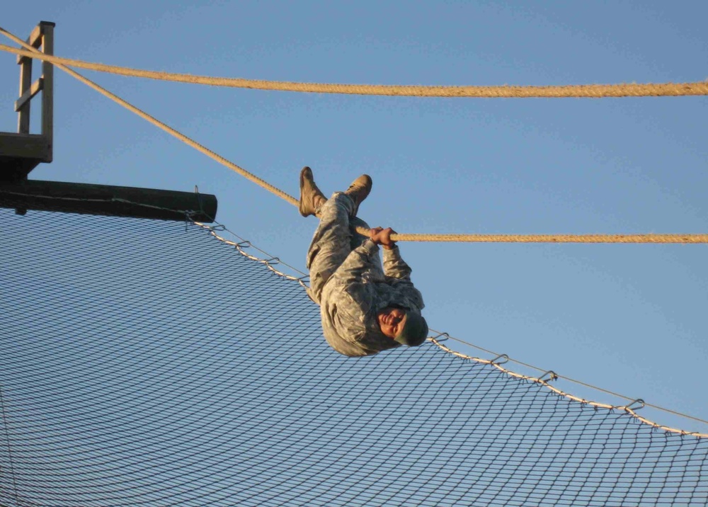 479th FA soldiers overcome obstacles for PT