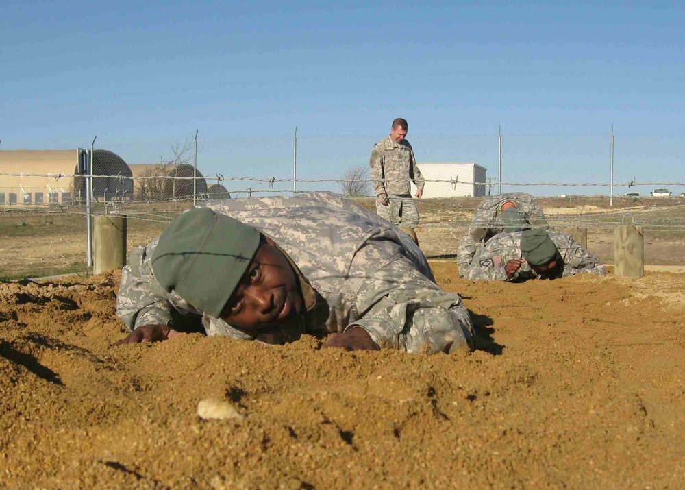 479th FA soldiers overcome obstacles for PT