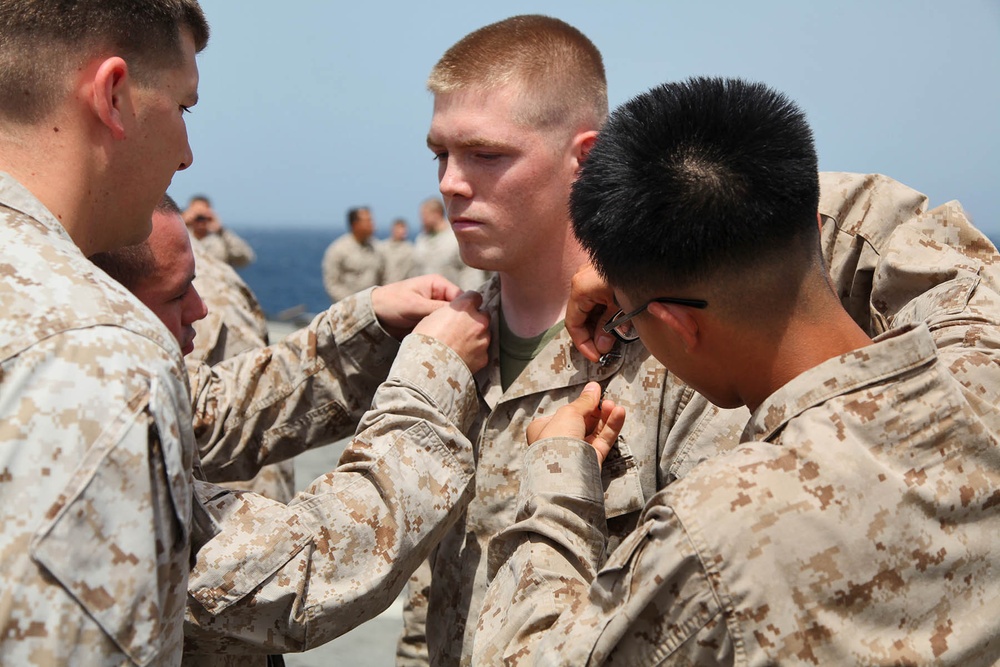15th MEU March 1 promotions on USS Rushmore