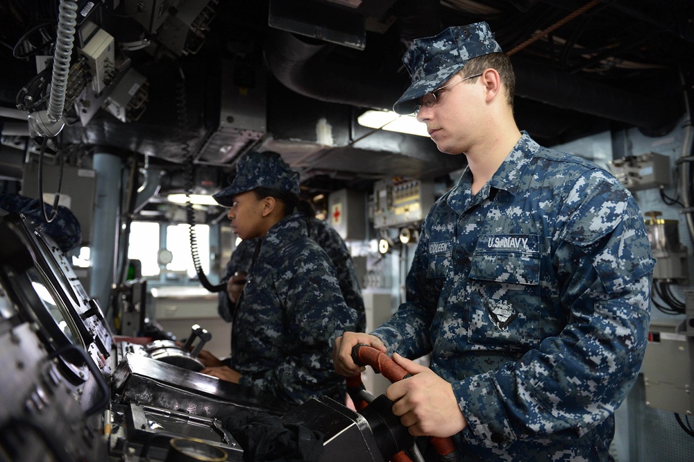 USS McCampbell transits out of Yokosuka Bay