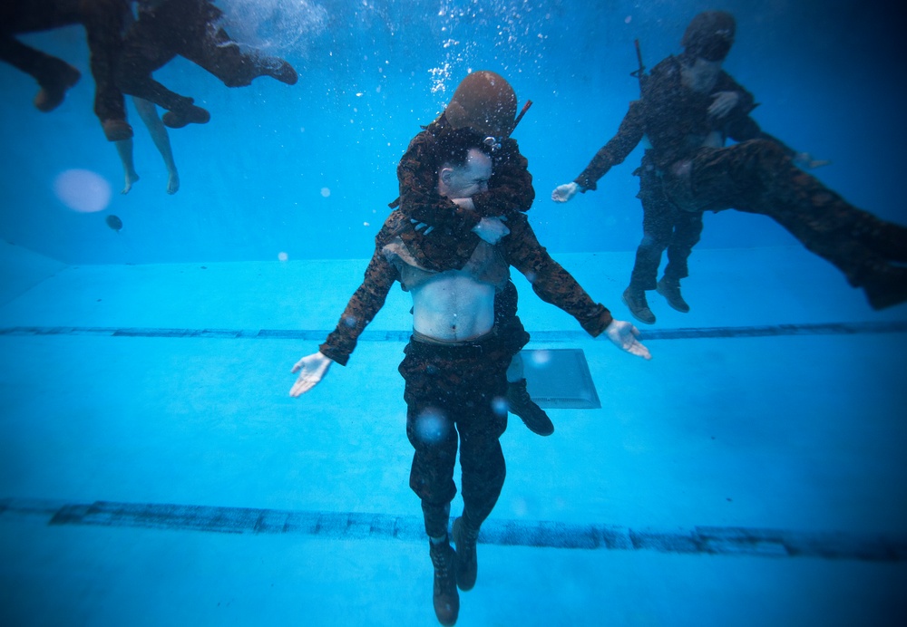 Keeping Afloat: Marines fight to earn title as water survival instructors