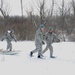 Muleskinners pull a sled during competition