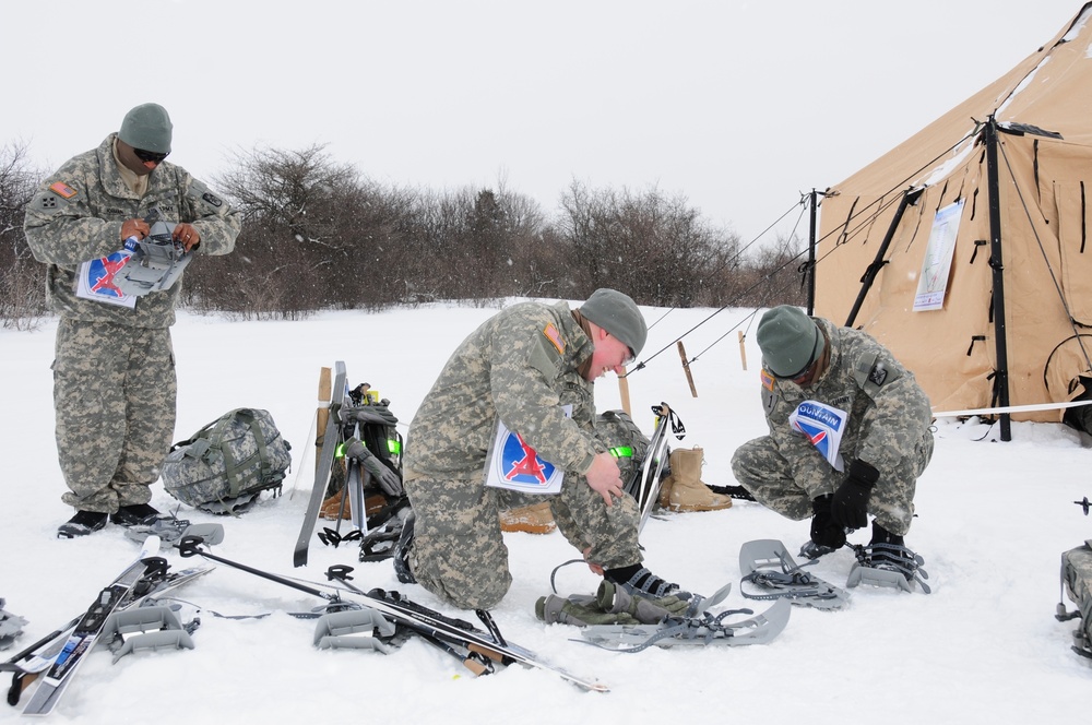 Soldiers prepare to snowshoe