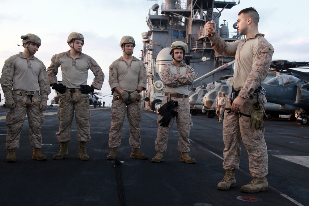 Helicopter Rope Suspension Technique Masters, Maritime Raid Force practice rappelling techniques