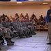 Retired Chief Master Sgt. of the Air Force Bob Gaylor speaks to Team Mildenhall airmen