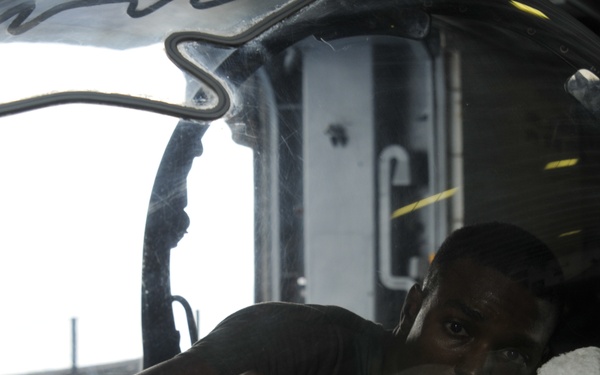 Squadron Marines clear AV-8 canopy