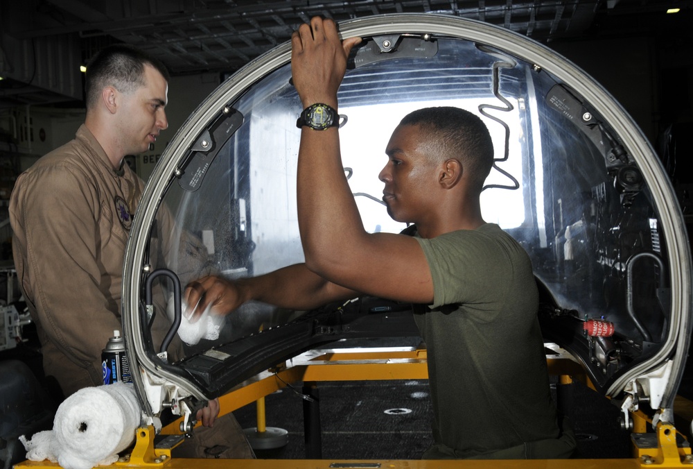 Squadron Marines clear AV-8 canopy