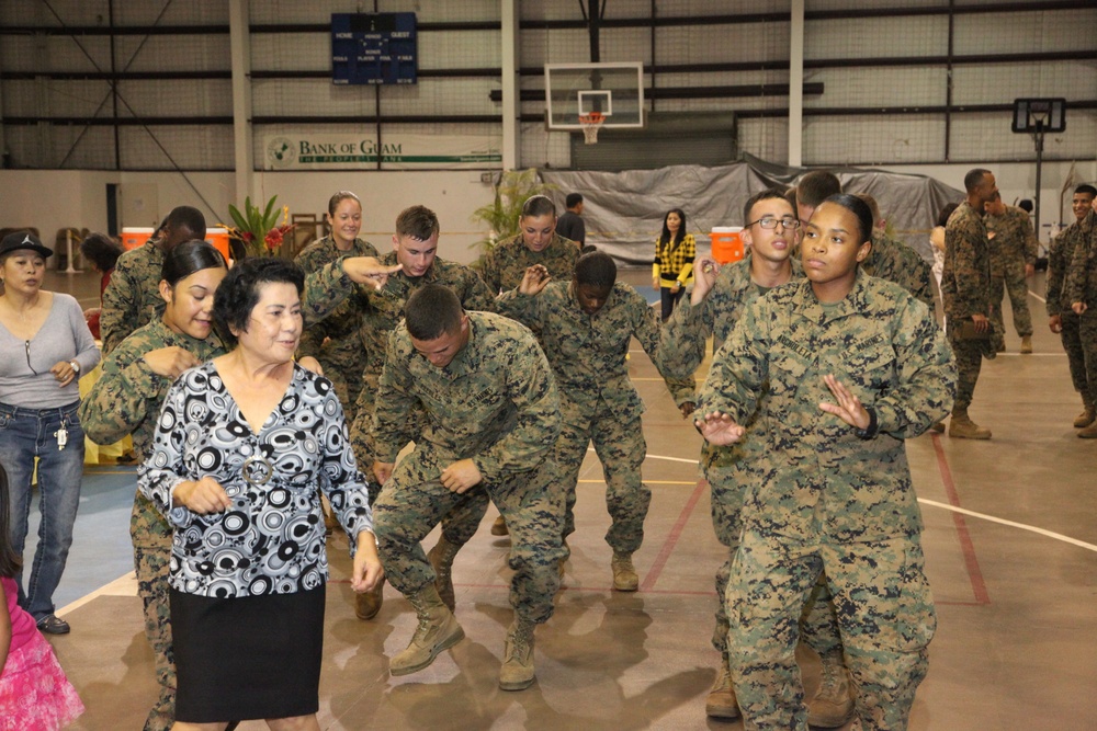 Marines help Yigo celebrate during Guam’s National Guard send-off