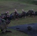 Marines practice stretcher carries during workout