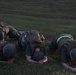 Marines practice stretcher carries during workout