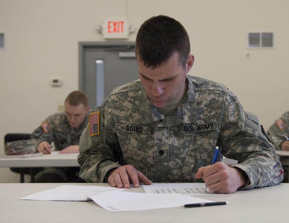 Soldiers take exam at 372nd Engineer Brigade's Best Warrior Competition