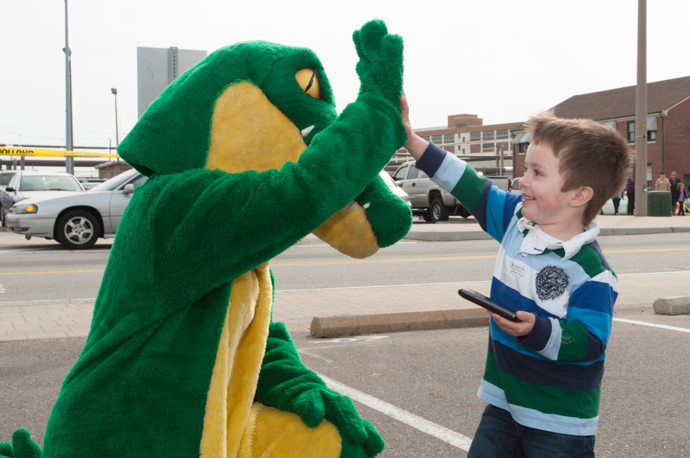 USS Kearsarge's mascot gives a high five