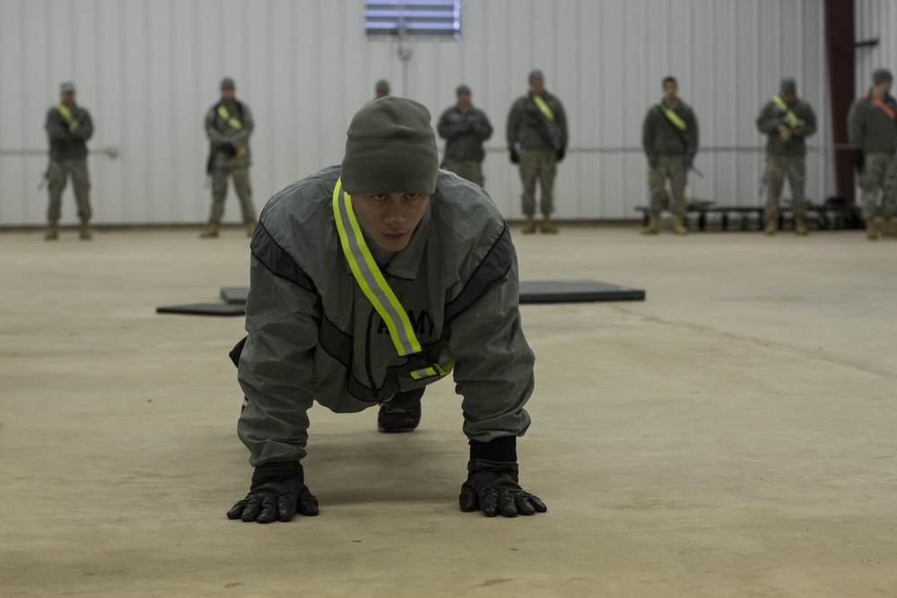 Pfc. Ballard does push-ups for the  APFT in the Best Warrior Competition