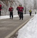 Best Warrior Competitors run two miles in winter conditions