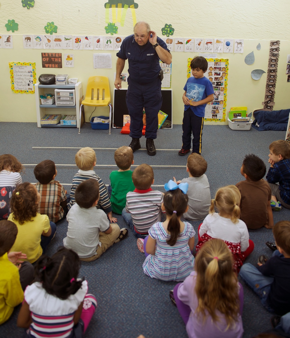 Coast Guard Auxiliarist teaches students about boating safety