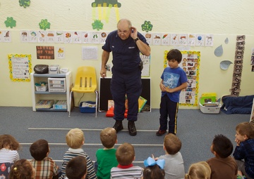 Coast Guard Auxiliarist teaches students about boating safety